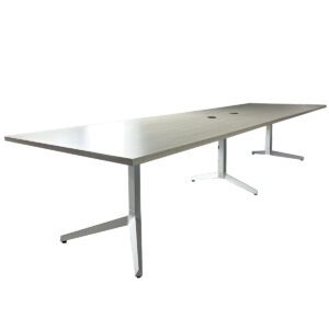 Used 12' Knoll Grey Woodgrain Laminated Conference Table with Power This large Knoll conference table is designed for professional settings, featuring integrated power for connectivity. Grey woodgrain laminate surface for a modern aesthetic. Built-in power access for charging devices and presentations. Sturdy silver metal legs  Overall Dimensions: 143¾"W x 41½"D x 28¼"H Ideal for boardrooms, collaborative spaces, and executive meeting areas.