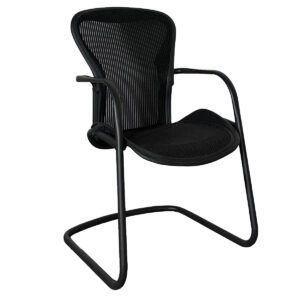 Used Herman Miller Aeron Guest Chair with Sled Base This guest chair features a full mesh design in black for breathable comfort and a sleek sled base for stability. Ideal for reception areas, conference rooms, or as a stylish visitor chair. Full mesh construction for ergonomic support Sturdy sled base for stability Compact design suitable for various office spaces Dimensions: 22.3/8"W x 21"D x 37.3/4"H Perfect for guest seating in professional settings.