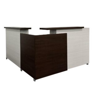 Used Groupe Lacasse L-Shape Double Pedestal Reception Desk in Classic Chocolate & Salta Laminated Finish This functional L-shaped reception desk combines a modern aesthetic with practical storage solutions. Includes one mobile BBF pedestal and one fixed BBF pedestal, each offering ample filing and organizational capacity. Classic Chocolate & Salta laminated finish One mobile BBF pedestal (Box, Box, File) One fixed BBF pedestal (Box, Box, File) Dimensions: 77"W x 71"D x 43"H Ideal for reception areas, administrative spaces, and front offices.