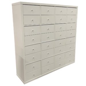 Used 32 Drawer Storage Cabinet in White This cabinet would be useful in various settings such as an office, school, or home, where organizing small to medium-sized items efficiently is important. The multiple drawers allow for categorizing and easy access to stored items. 32 drawers, providing ample storage for mail, phones, personal effects, and other items. White For Modern Aesthetic  Dimensions:  58" W x 15" D x 58"H  