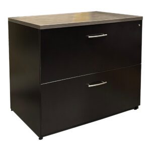 Used Two-Tone 36" W Two-Drawer Lateral File with Silver Pull Handles This two-drawer lateral file features a gray woodgrain top and black frame finish complemented by sleek silver pull handles for a professional and modern look. Two spacious lateral file drawers for ample document storage. Two-tone finish enhances style and visual appeal. Sturdy construction suitable for commercial or residential use. Dimensions: 36"W x 25"D x 29.1/4"H Ideal for organizing files in offices, home workspaces, or collaborative environments.