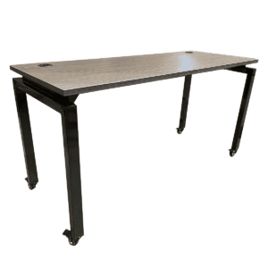 Used 60" W Clear Design Mobile Table on Casters with Black Frame in Shadow Elm Laminated Finish This Clear Design mobile table features a Shadow Elm laminated finish and a sturdy black frame on casters, allowing for easy mobility in various spaces. Shadow Elm laminated  Black frame with casters for easy movement Dimensions: 60"W x 24"D x 32"H Perfect for commercial workspaces, meeting rooms, or collaborative areas that need flexible table setups.