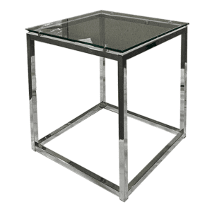 Used 18"W Glass Side Table With Polished Metal Frame  This 18" wide glass side table features a sleek glass top and polished metal frame designed to fit neatly in small spaces, providing a functional surface for various uses. Glass surface  Polished Metal Frame  Compact design  Dimensions: 18"W x 18"D x 20"H Perfect for commercial or residential use in lounges, living rooms, or office reception areas.various uses. Glass surface for a clean, modern look Compact design for versatile placement Dimensions: 18"W x 18"D x 20"H Perfect for commercial or residential use in lounges, living rooms, or office reception areas.